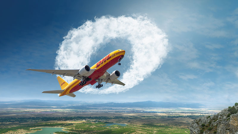 Photo rendering of a zero-shaped cloud behind a DHL aircraft